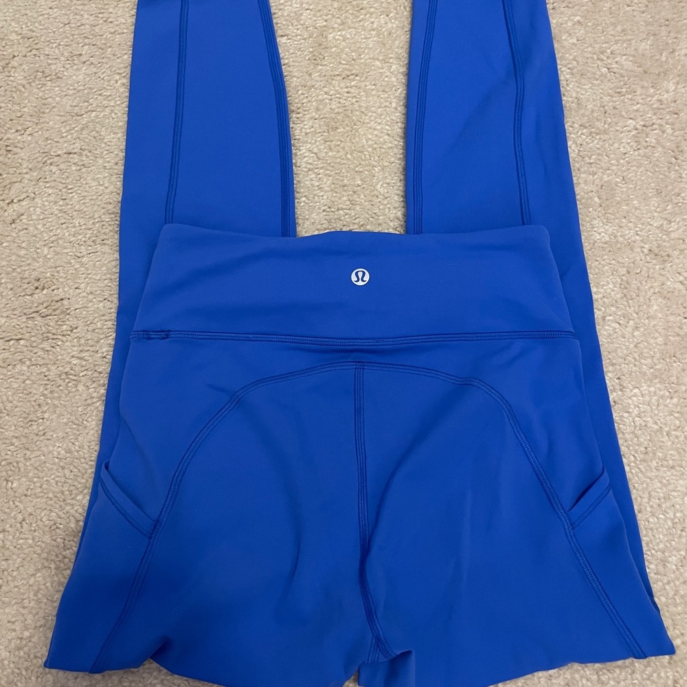 Invigorate high-rise 25” size 4 
Color: Cerulean Blue.